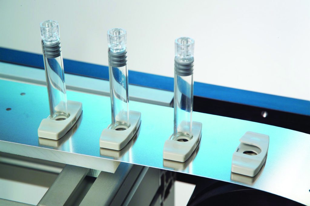 Syringes being manufactured