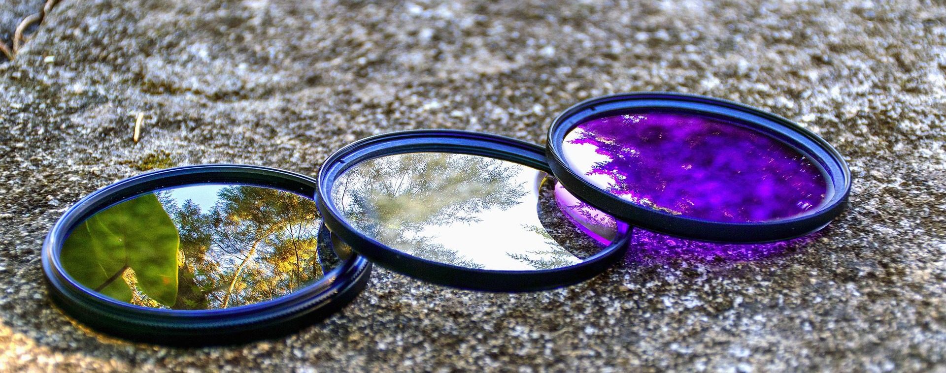 Perforated Metal Conveyor Belts for Transporting Glass Through a Vacuum Deposition Process