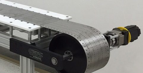 Metal Conveyor Belt for a Vapor Deposition Process in High Vacuum